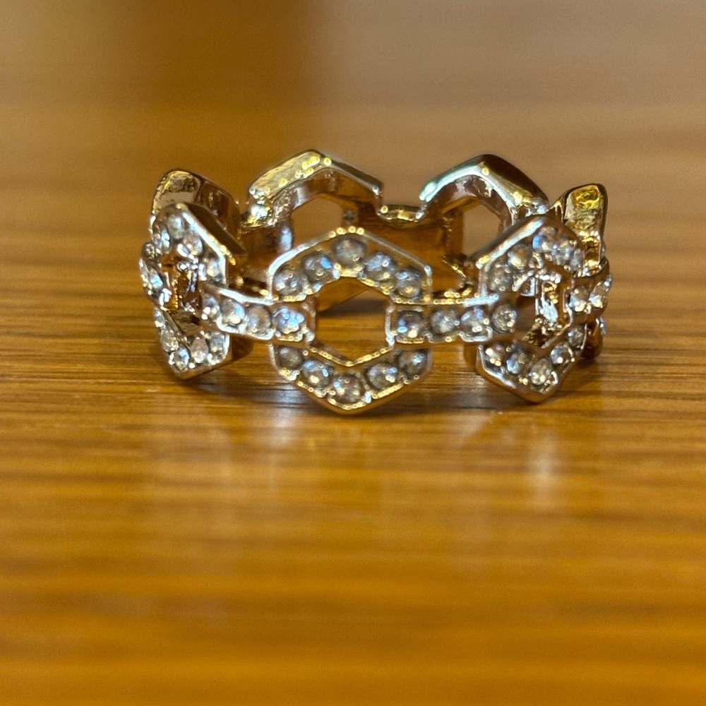 NIB size 8 gold tone ring.